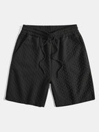 Set – geometrické jacquard polo a krátké kalhoty