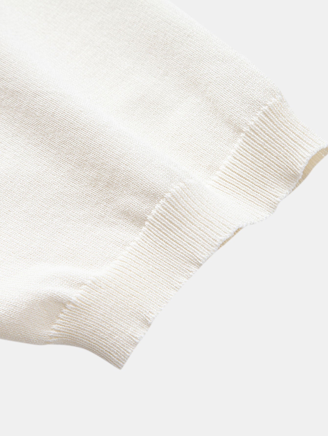 Set – geometrický jacquard polo a přiléhavé kalhoty