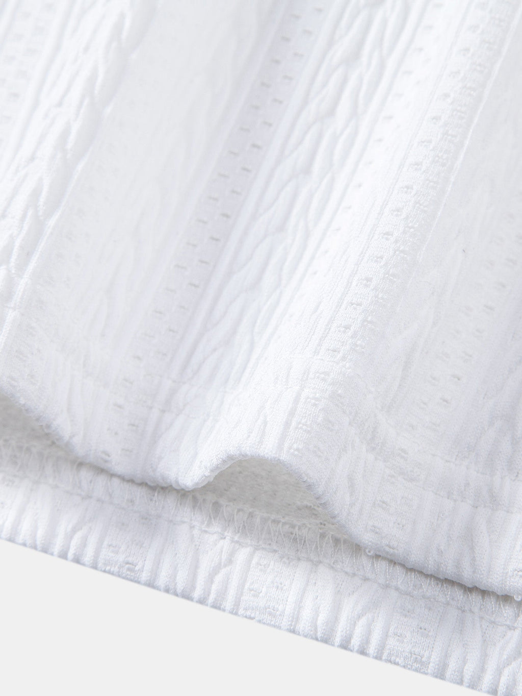 Set – elegantní geometrický jacquard polo a slim kalhoty