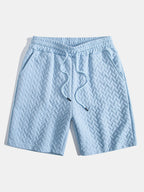 Set – geometrické jacquard polo a krátké kalhoty