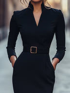 Elegantní černé šaty s páskem a splývavým střihem