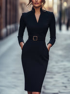 Elegantní černé šaty s páskem a splývavým střihem